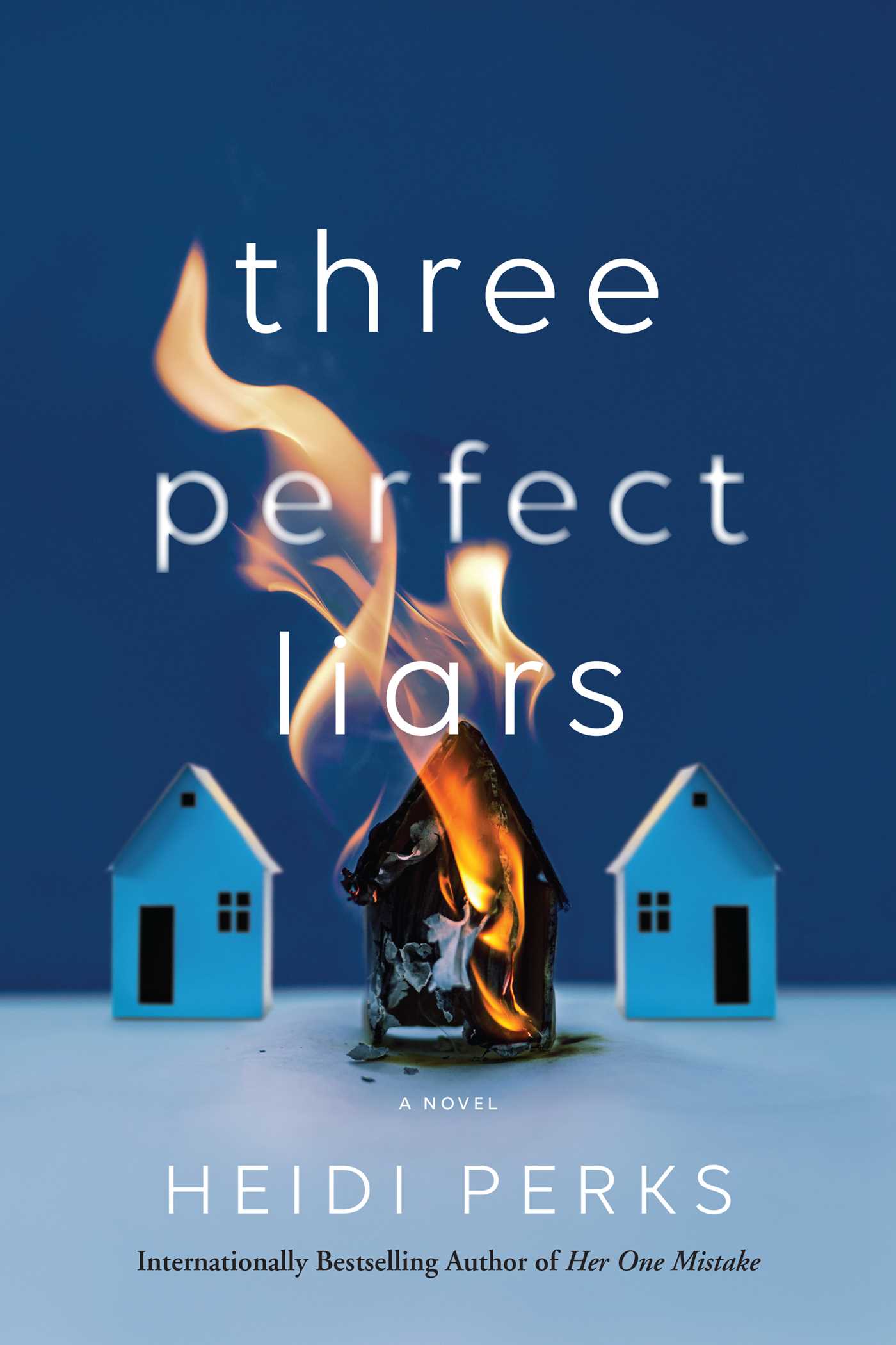 Blue cover with three little houses on the cover. The middle one is on fire.