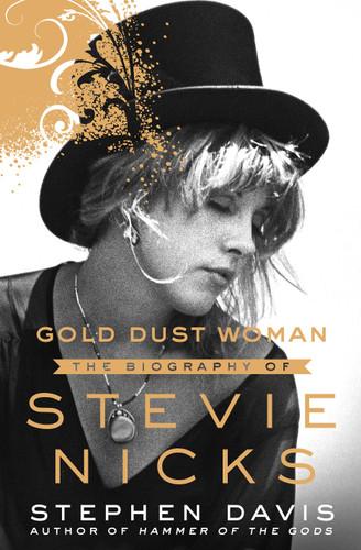 White cover features the a young Stevie Nicks on the front. She wears a black top hat with gold emerging feather like from her hat. The picture is in black and white.